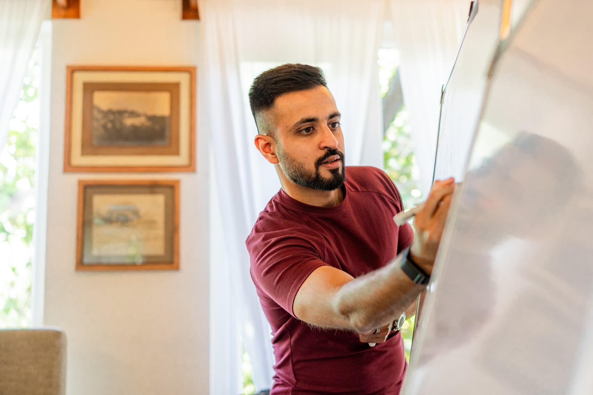 Sid writing on whiteboard